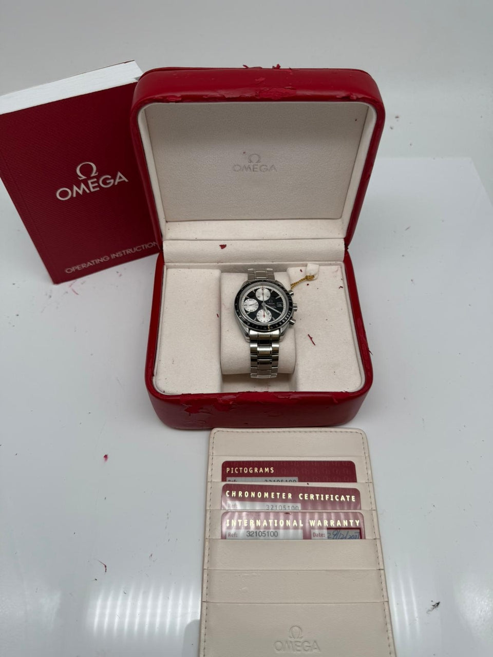 Omega Speedmaster Date 40mm Automatik 32105100 - Papiere und oder Lieferumfang