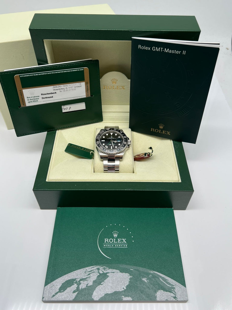 Rolex GMT-Master II Automatik Herrenuhr 40mm 116710LN - Papers and documentation
