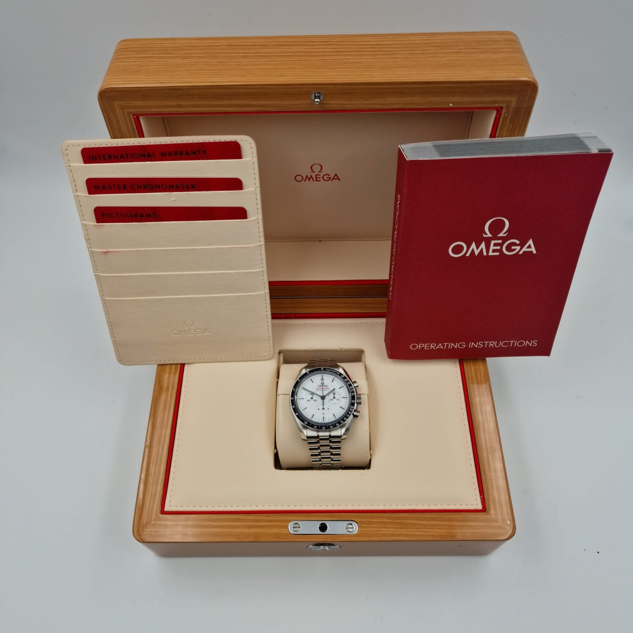 Omega Speedmaster Professional Moonwatch White mit Push-Schließe 31030425004001 - Papiere und oder Lieferumfang