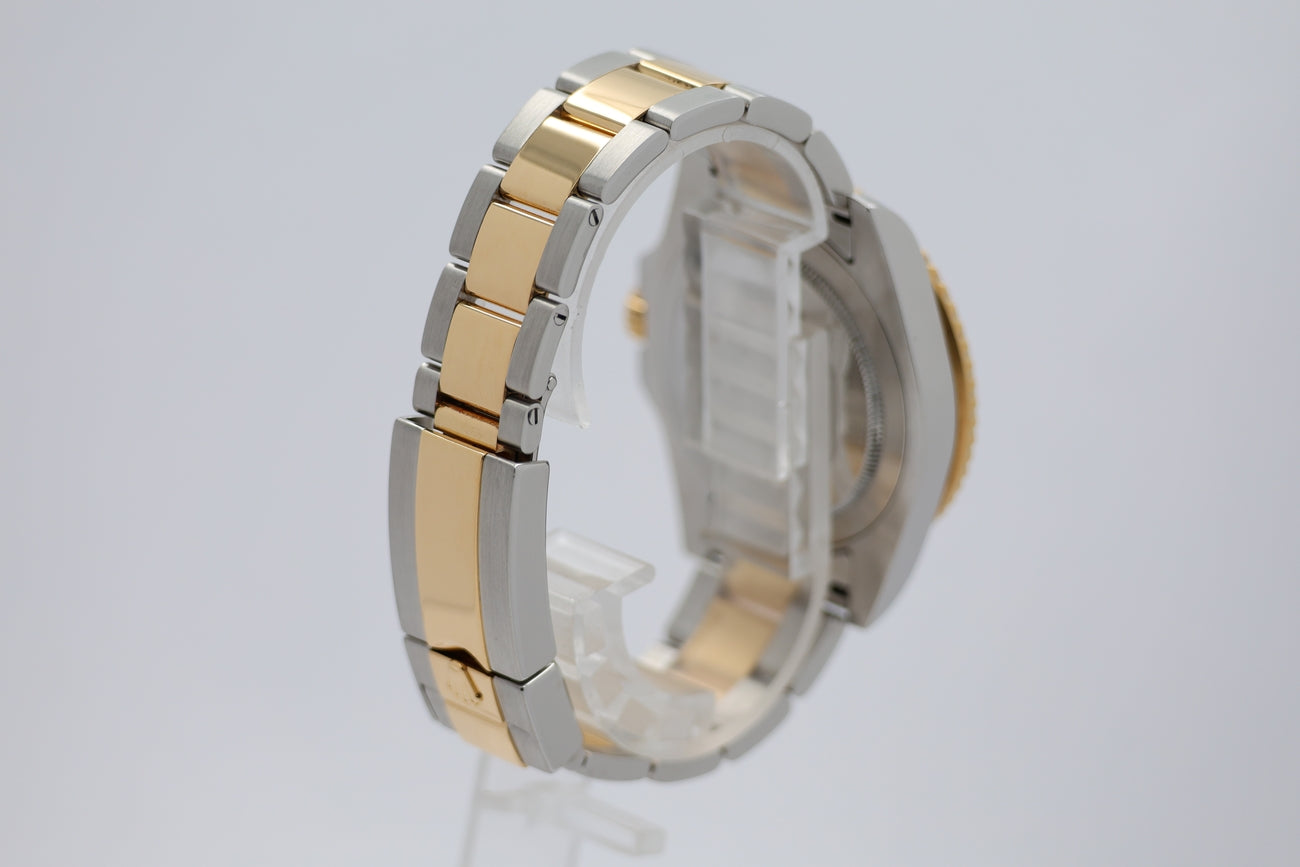 Rolex Rolex GMT-Master II Stahl/Gold 116713LN - Detailansicht 1
