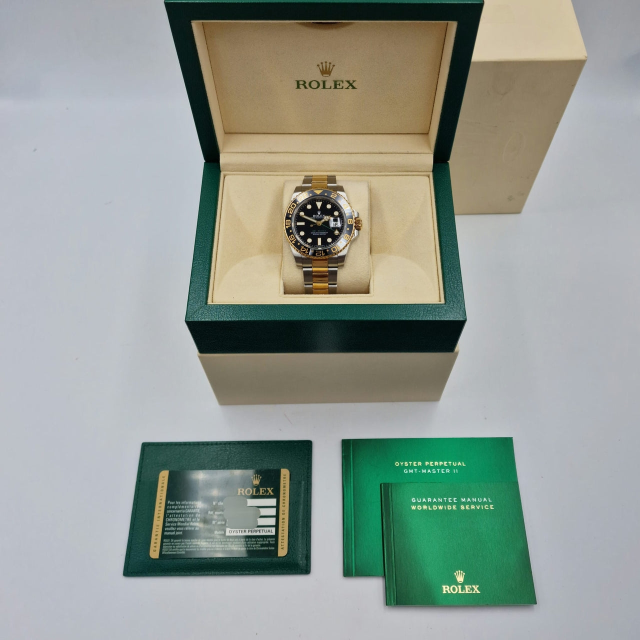 Rolex Rolex GMT-Master II Stahl/Gold 116713LN - Papiere und oder Lieferumfang