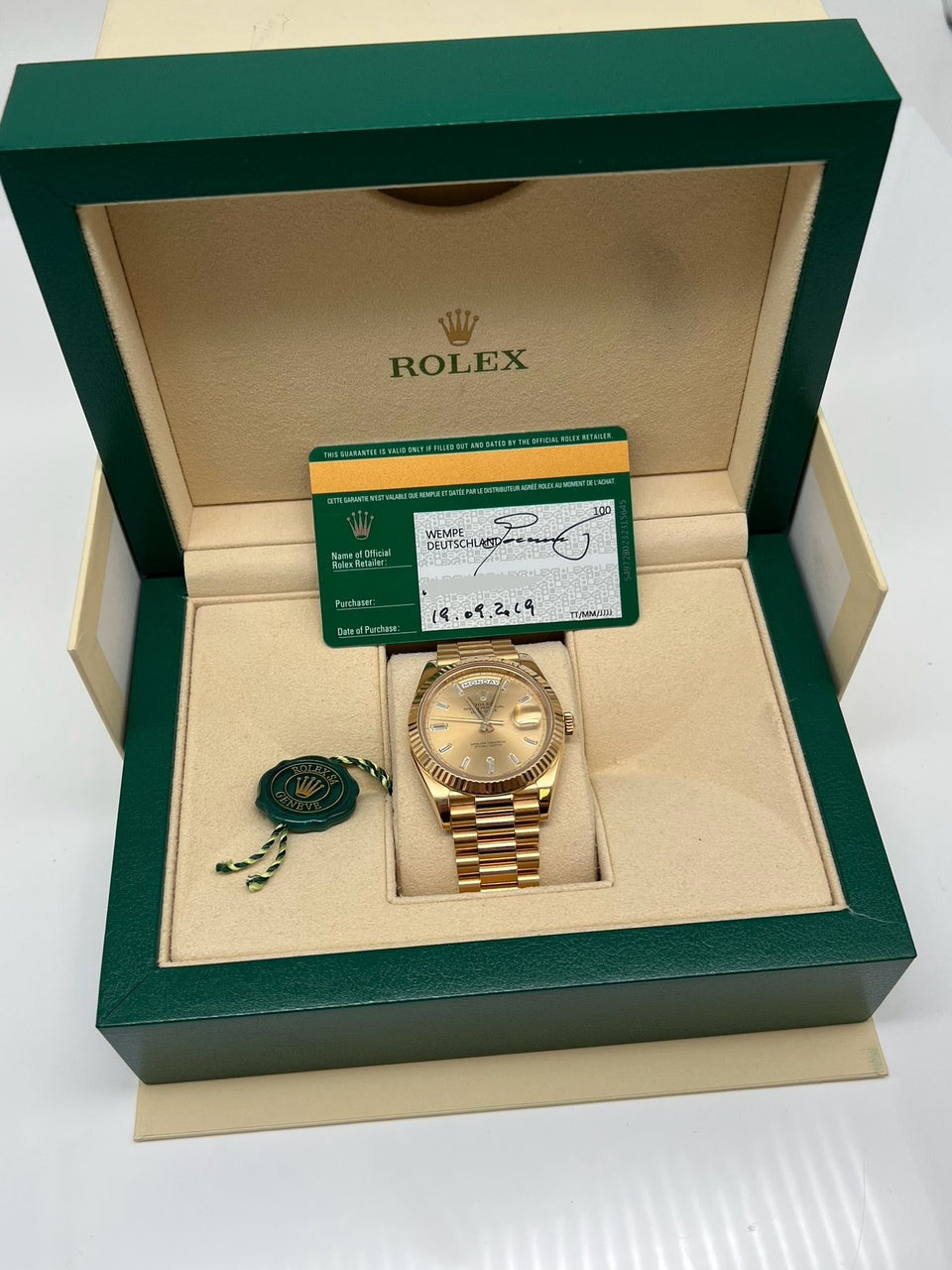 Rolex Day-Date 40 Gelbgold Baguette Dial Automatik LC100 228238 - Papiere und oder Lieferumfang