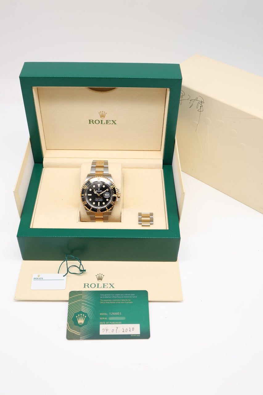Rolex Sea-Dweller Stahl/Gold Schwarz None 126603 - Papiere und oder Lieferumfang