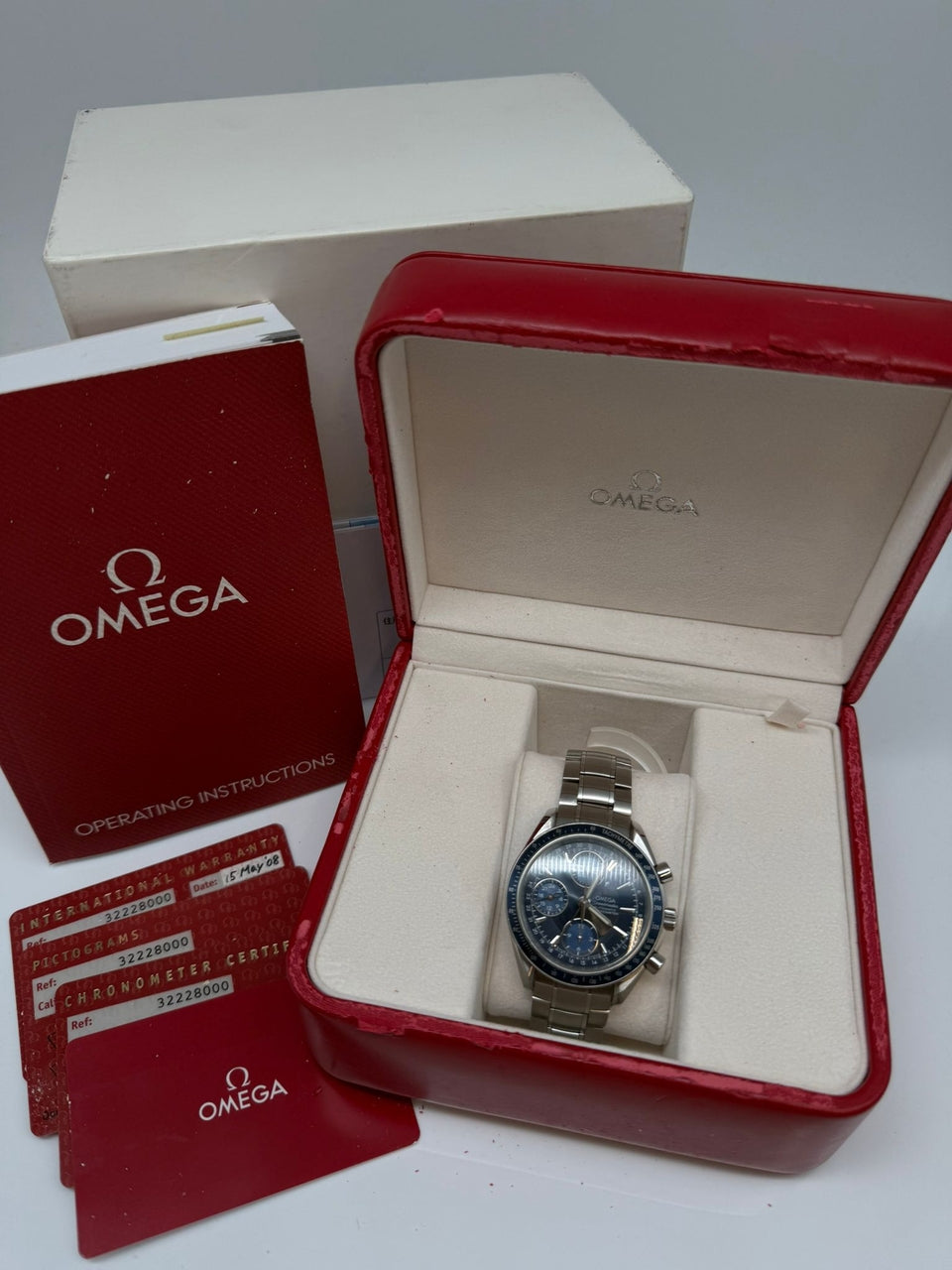 Omega Speedmaster Day Date Automatik 40mm 32228000 - Papiere und oder Lieferumfang