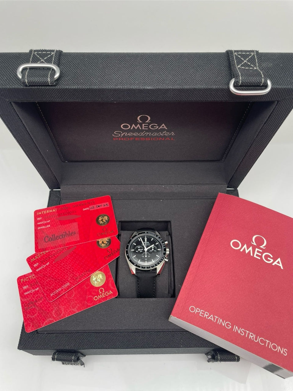 Omega Speedmaster Professional Moonwatch 42mm Hesalit 31032425001001 - Papiere und oder Lieferumfang