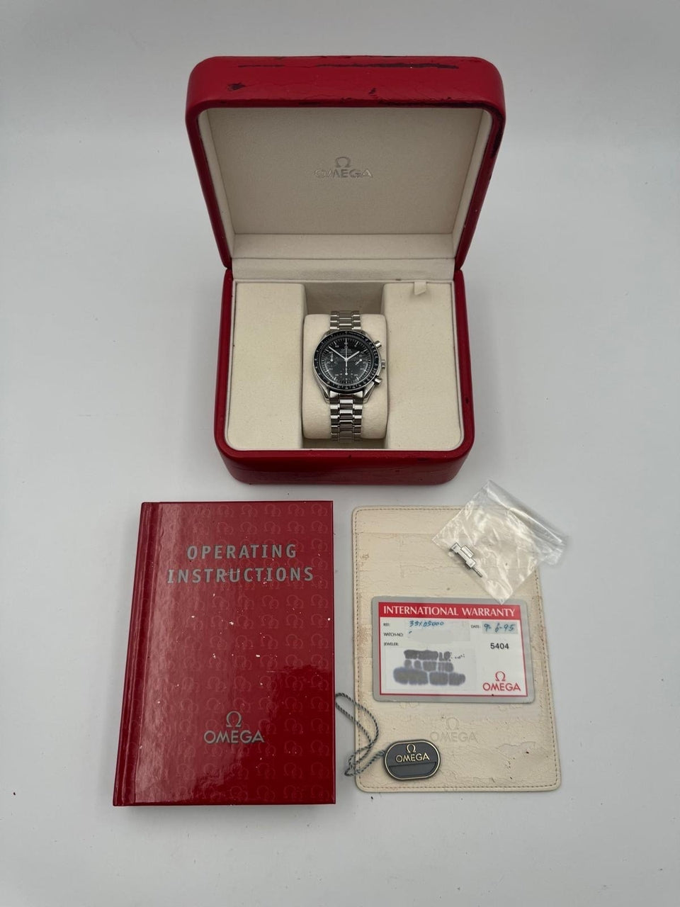 Omega Speedmaster Reduced Automatik Herrenuhr   35105000 - Papiere und oder Lieferumfang