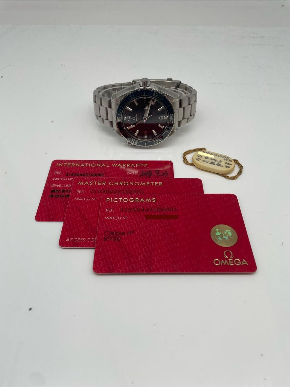 Omega Seamaster Planet Ocean 43,5mm Automatik Blau 21530442103001 - Papiere und oder Lieferumfang