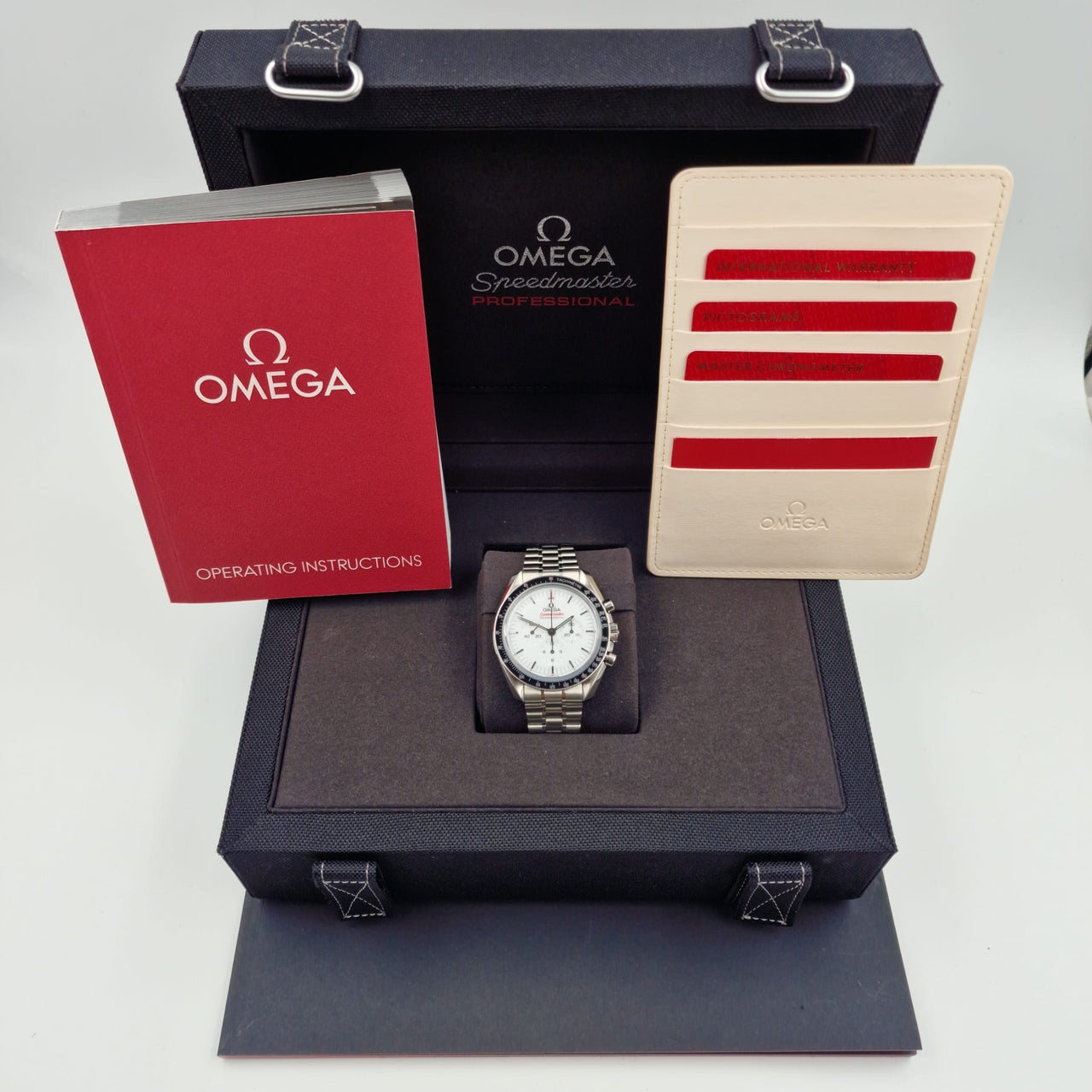 Omega Speedmaster Professional Moonwatch White mit Push-Schließe 31030425004001 - Papiere und oder Lieferumfang