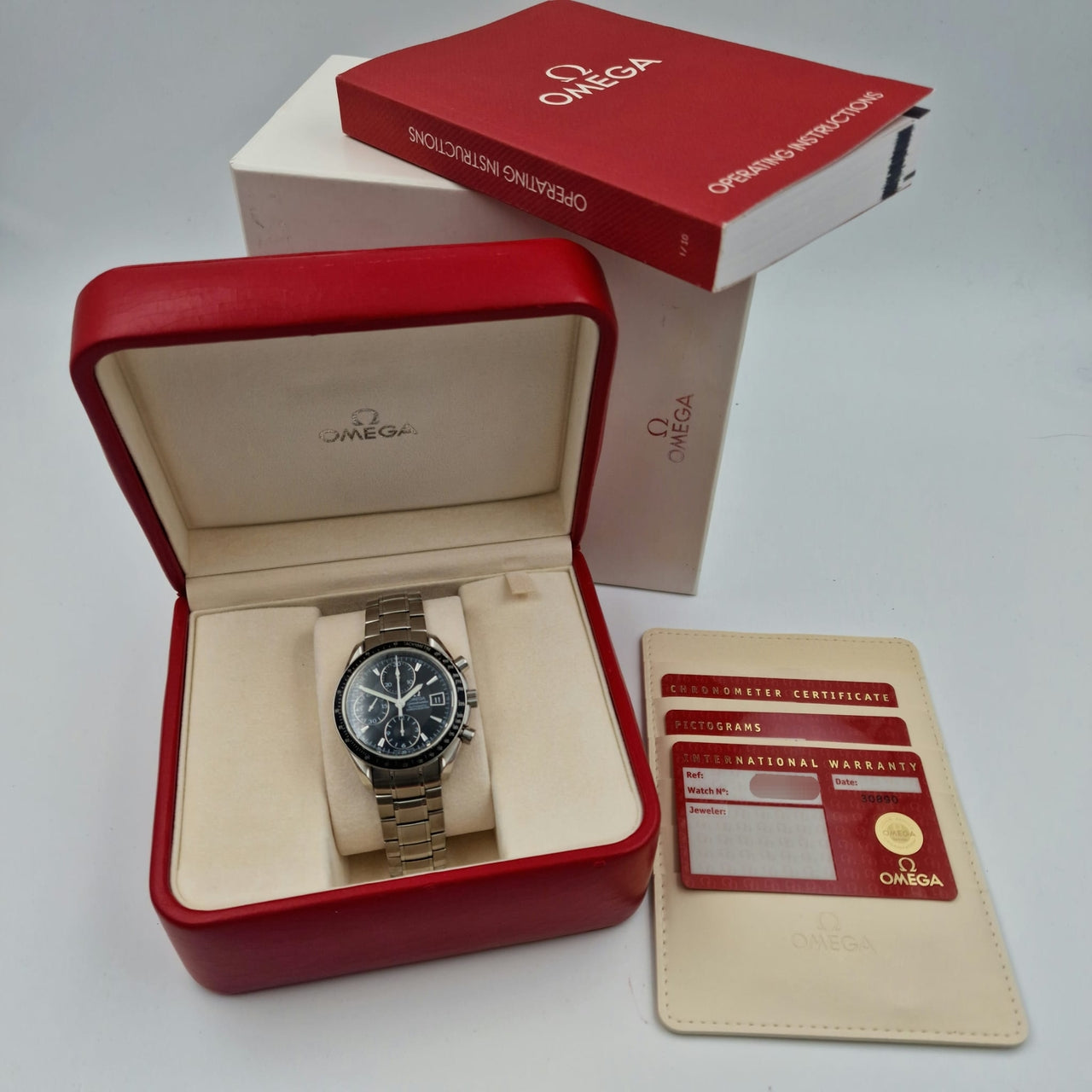 Omega Speedmaster Date 40mm Automatik  32105000 - Papiere und oder Lieferumfang