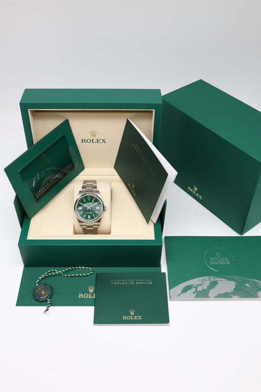Rolex Oyster Perpetual 41 Grün 124300 - Papiere und oder Lieferumfang