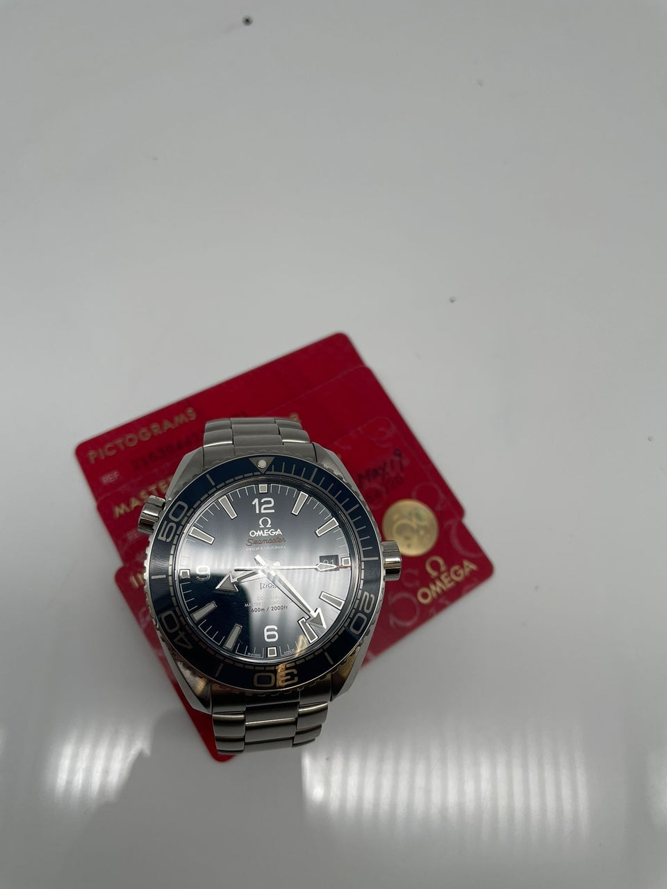 Omega Seamaster Planet Ocean 43,5mm Automatik 21530442103001 - Papiere und oder Lieferumfang