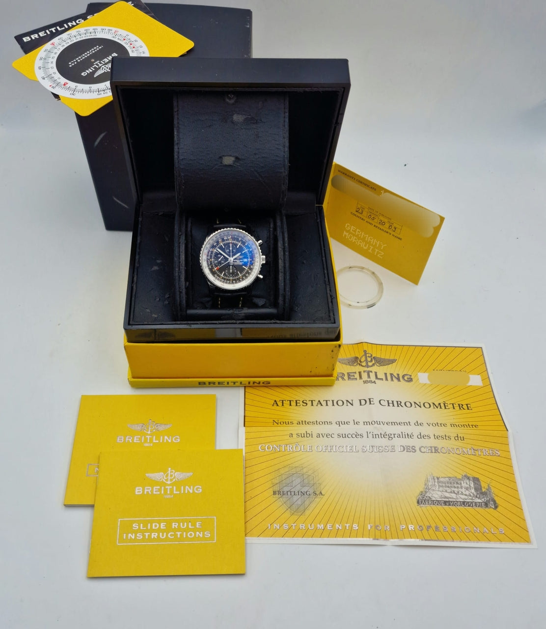 Breitling Navitimer World GMT 46 Automatik Herrenuhr	 A24322 Box + og. Papiere