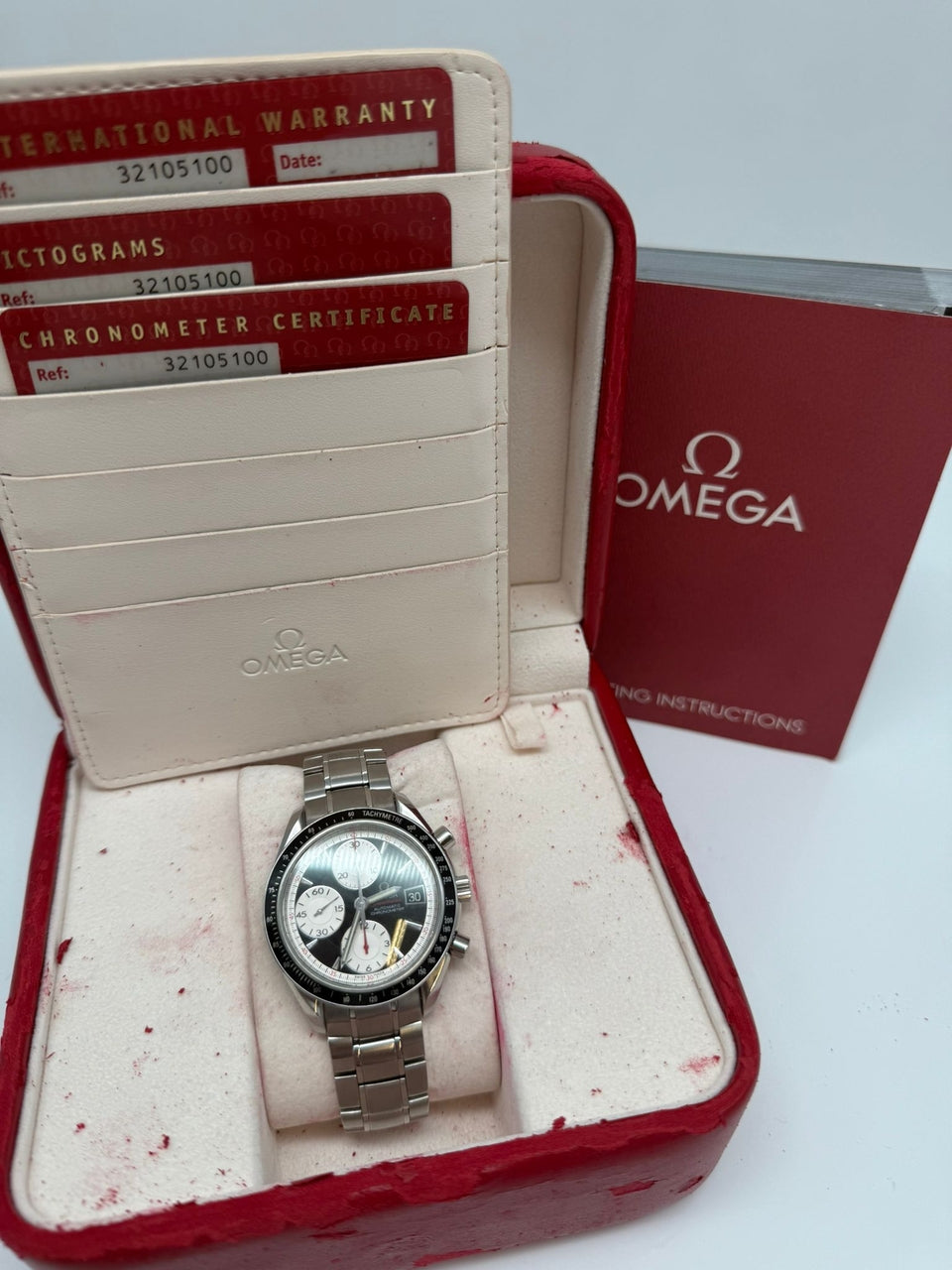 Omega Speedmaster Date 40mm Automatik  32105100 - Papiere und oder Lieferumfang