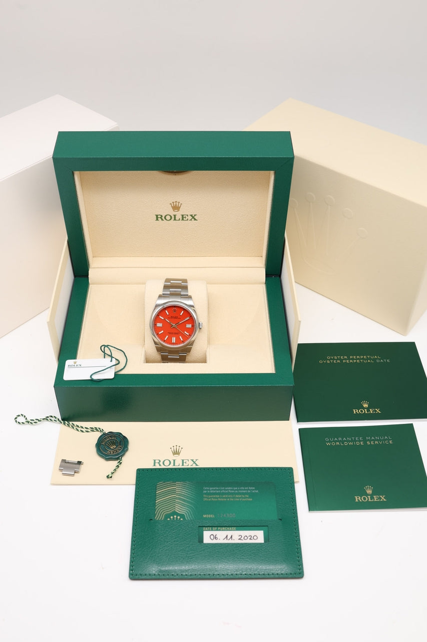 Rolex Oyster Perpetual 41 Coral Rot Automatik 124300 - Papiere und oder Lieferumfang
