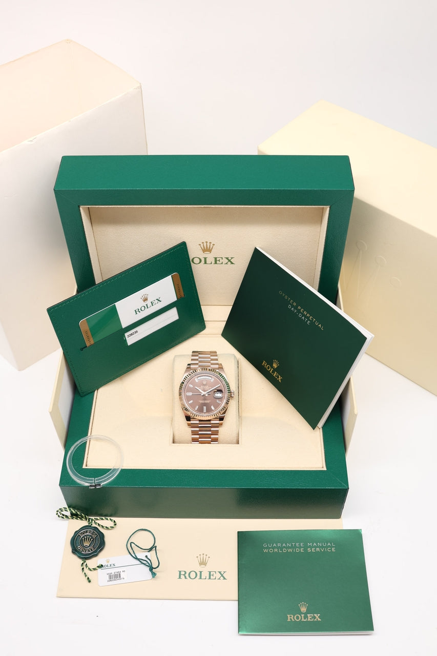Rolex Day-Date 40 Roségold Baguette Chocolate Dial 228235 - Papiere und oder Lieferumfang