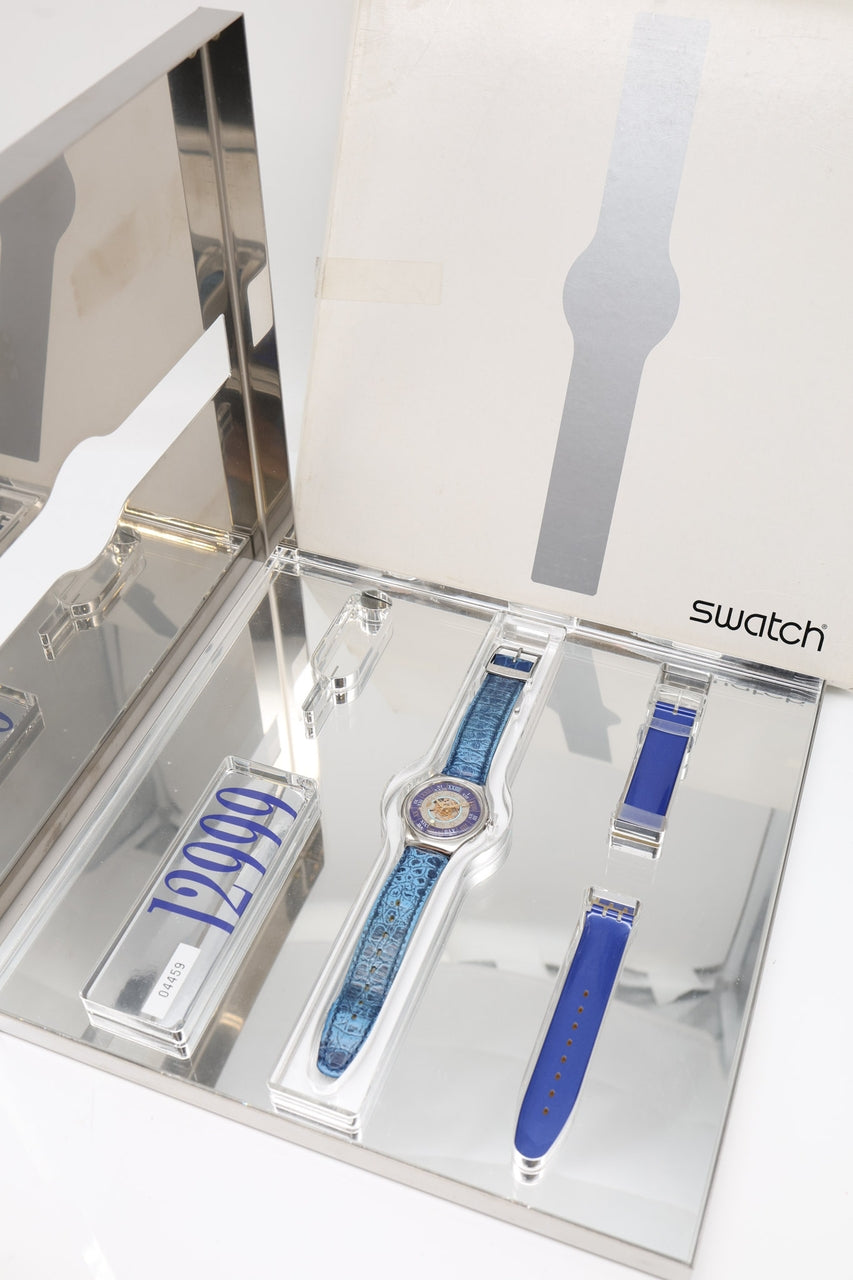 Swatch Tresor Magic 36mm Platin SAZ101 - Papiere und oder Lieferumfang
