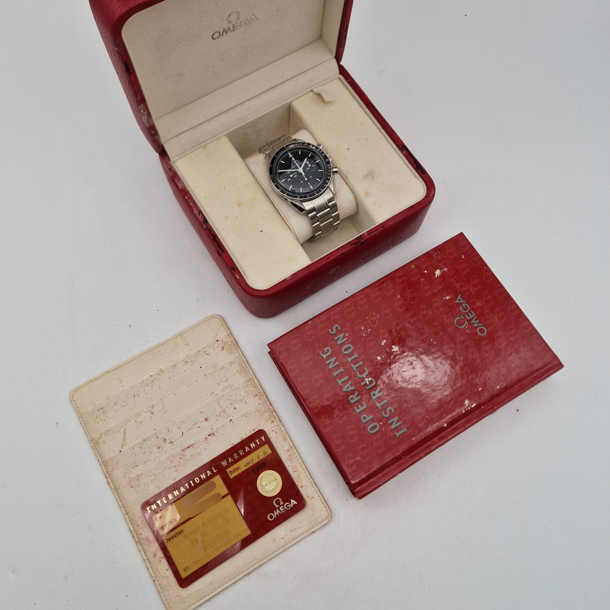 Omega Speedmaster Professional Moonwatch 42mm Handaufzug Herrenuhr 35705000 Box + og. Papiere