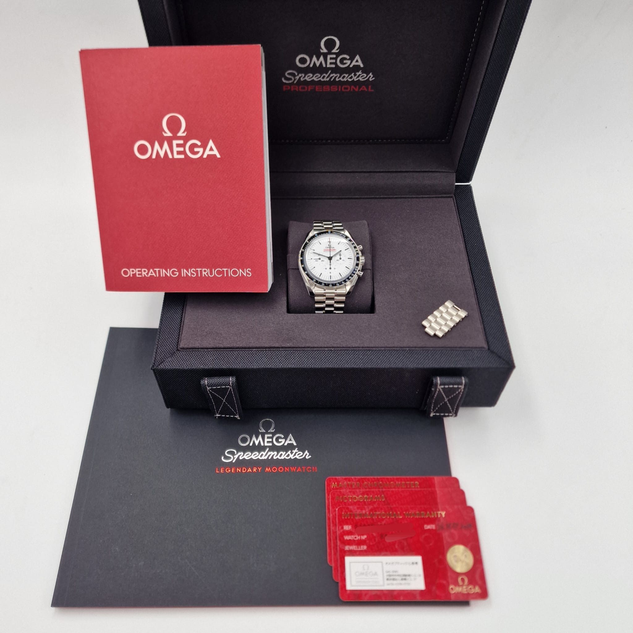 Omega Speedmaster Professional Moonwatch White mit Push-Schließe	 31030425004001 Box + og. Papiere