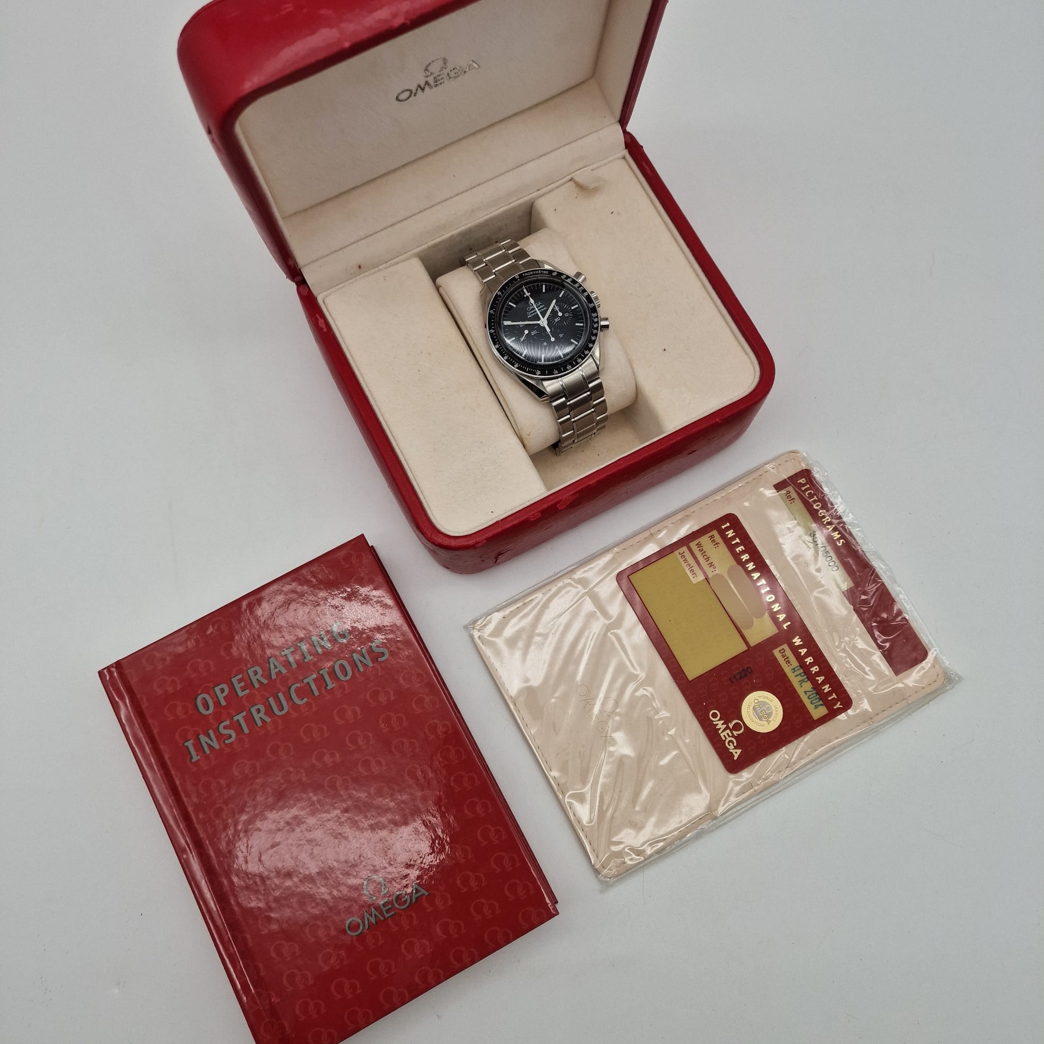 Omega Speedmaster Professional Moonwatch 42mm Handaufzug Herrenuhr 35705000 Box + og. Papiere