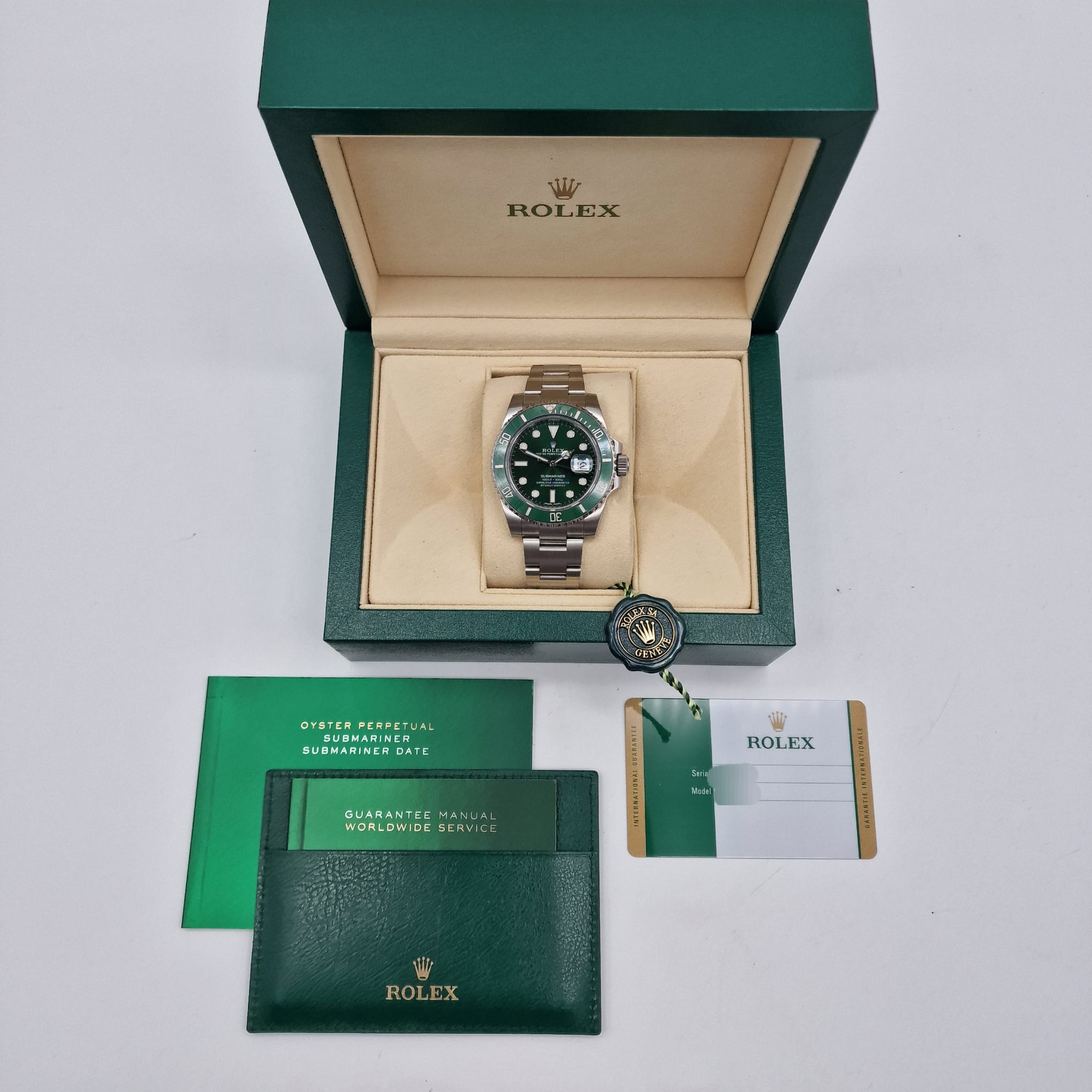 Rolex Submariner Date "Hulk" Automatik Herrenuhr	 116610LV Box + og. Papiere